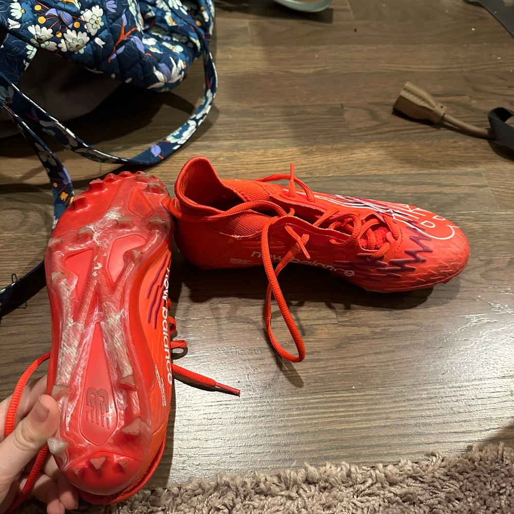 Red New Balance Cleats
